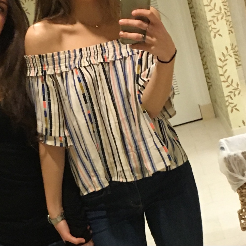 Astr the label over the shoulder top